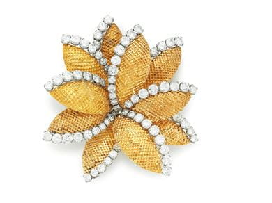 A gold and diamond brooch by Van Cleef- Arpels