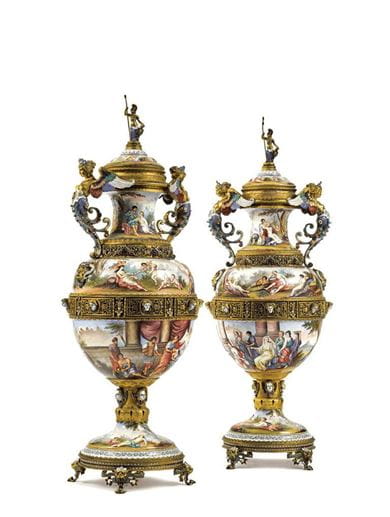 A pair of Austrian gilt-metal and enamel large two-handled vases and covers, late 19th century. Courtesy Sotheby’s