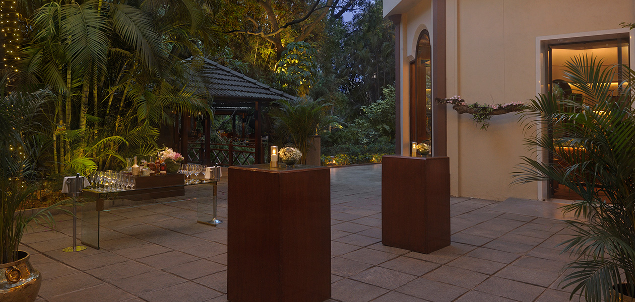Elegant outdoor setting at 5 star Hotel The Oberoi Bengaluru.