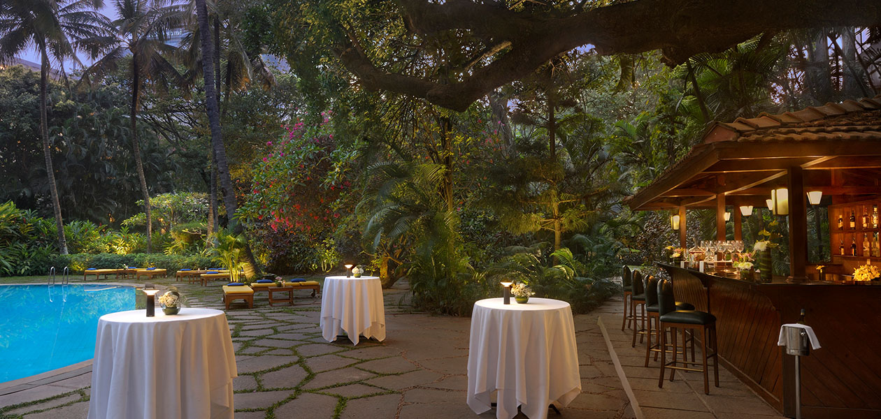  Outdoor bar near pool at The Oberoi Bengaluru hotel