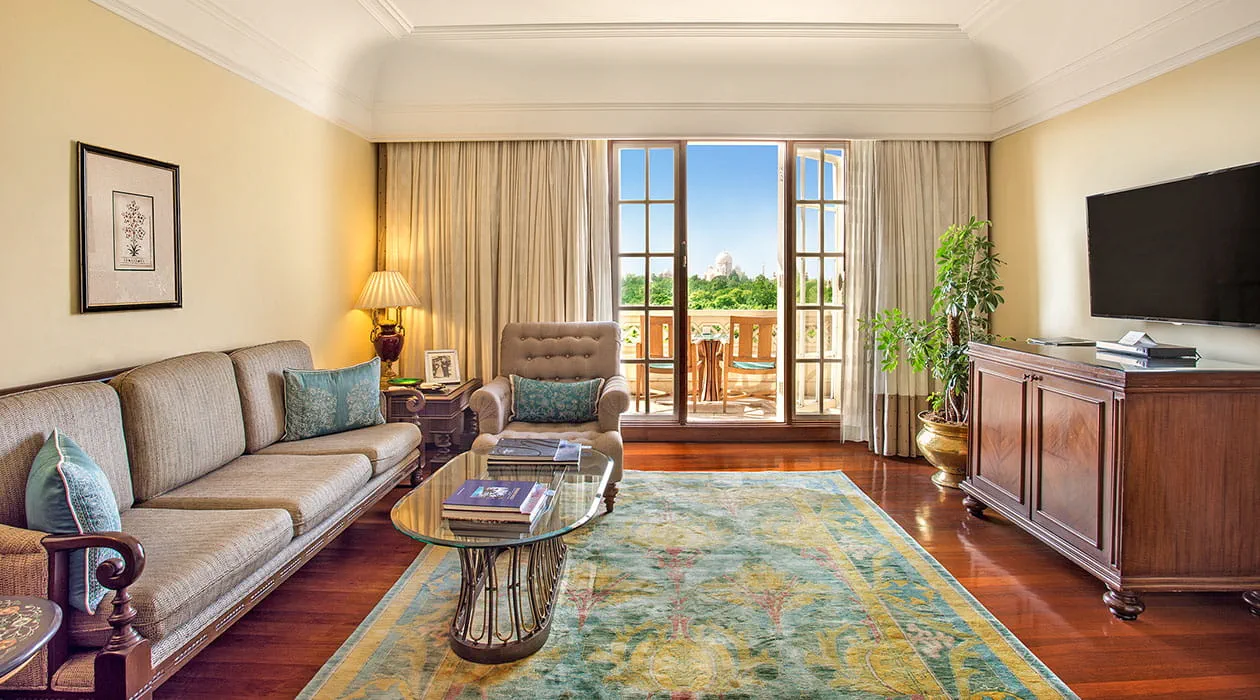 Deluxe Suite with private balcony at The Oberoi Amarvilas, Agra, offering Taj Mahal views.