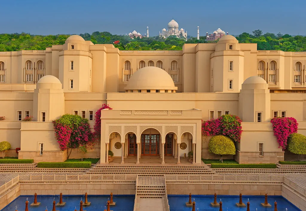 Grand arched corridor with Mughal-inspired architecture at The Oberoi Amarvilas, Agra.