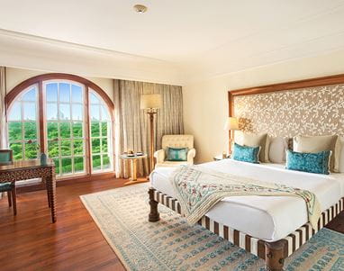 Elegant interiors of the Premier Room at The Oberoi Amarvilas, Agra with Mughal-inspired design and plush furnishings.