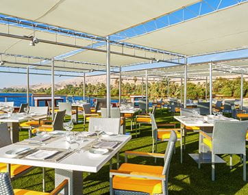 Poolside restaurant dining at The Oberoi Philae Nile Cruise
