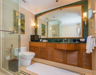  Elegant bathroom with mirror and vanity at The Oberoi Bengaluru hotel