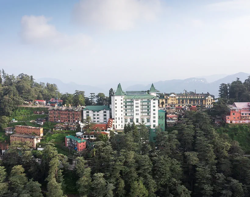 The Oberoi Cecil, luxury hotel amidst Shimla's scenic hillside landscape