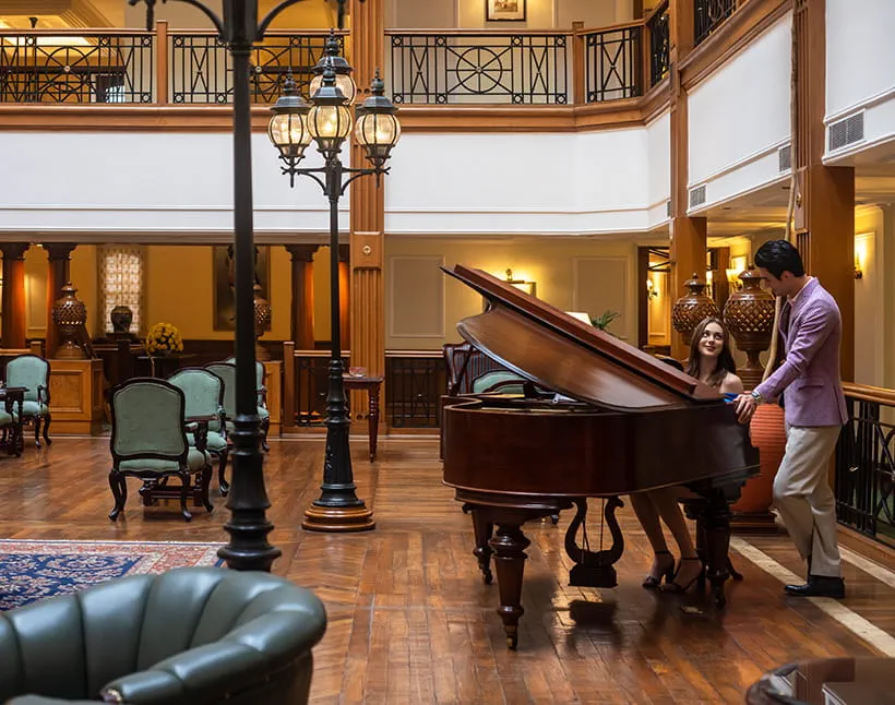Grand piano in luxury hotel lobby, The Oberoi Cecil, Shimla
