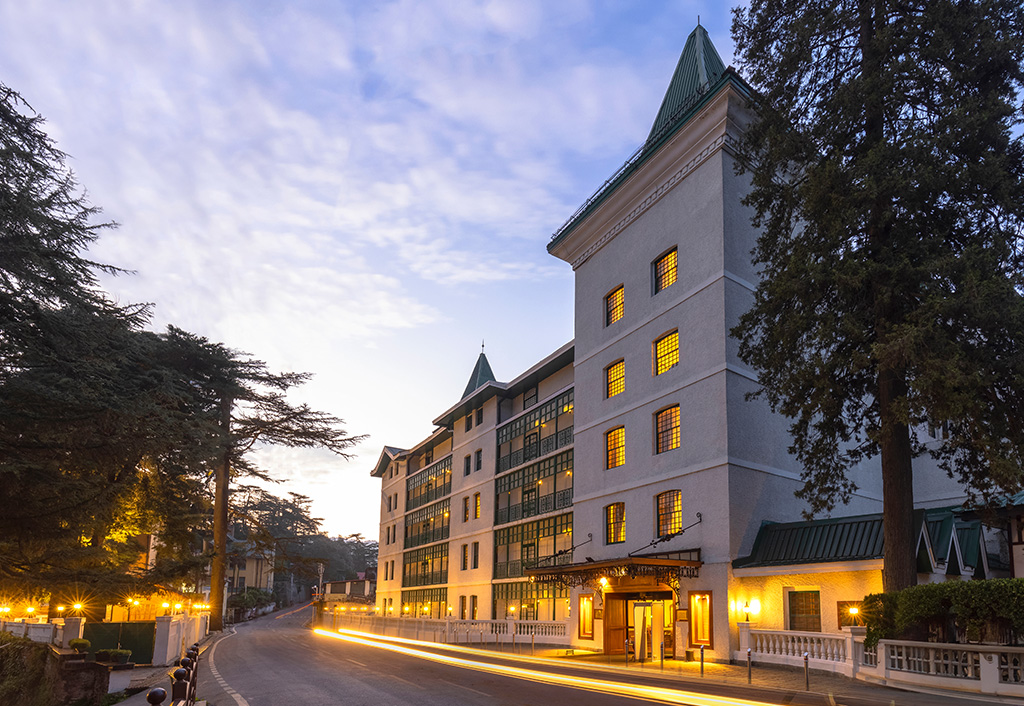 Five-star hotel, The Oberoi Cecil, Shimla at dusk with lights glowing