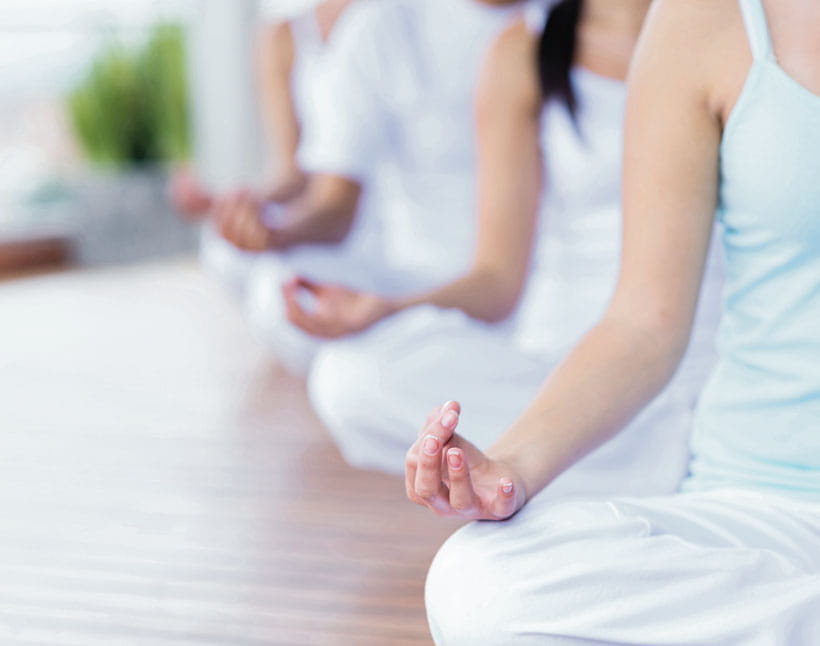 People meditating indoors at luxury 5-star hotel in Shimla