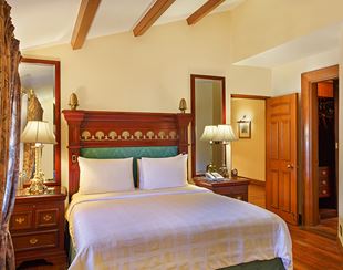 Elegant bedroom at the Oberoi Cecil, luxury hotel in Shimla