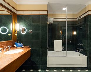 Luxury hotel bathroom with marble decor at The Oberoi Cecil, Shimla