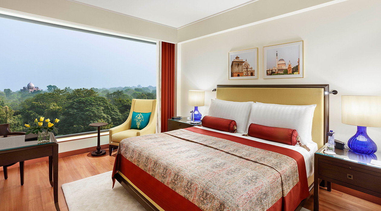 Luxurious room in The Oberoi New Delhi overlooking lush gardens
