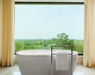 Deluxe room decor at The Oberoi New Delhi, 5 star hotel stay.