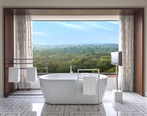 Luxurious bathtub with a view at The Oberoi New Delhi