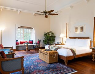 A luxurious bedroom at The Oberoi Sukhvilas, Siswan Forest Resort New Chandigarh
