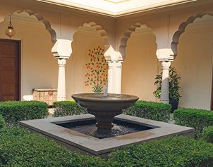 Elegant courtyard fountain at The Oberoi Sukhvilas, Siswan Forest Resort.