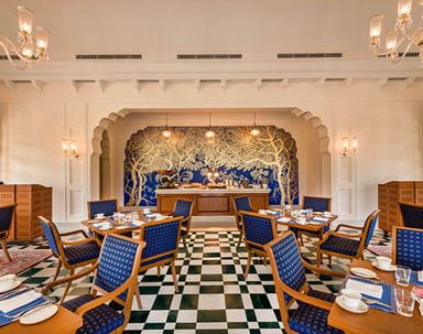 Dining room at The Oberoi Sukhvilas Resort, elegant decor, Siswan Forest