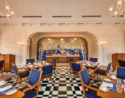 Dining room at The Oberoi Sukhvilas Resort, elegant decor, Siswan Forest