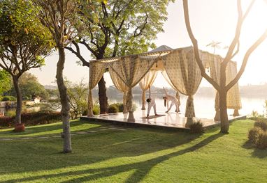 Private yoga session at The Oberoi Udaivilas, Udaipur – wellness retreat at a luxury resort.