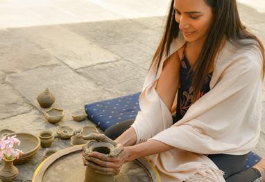 Clay modeling experience at The Oberoi Udaivilas, Udaipur, offering hands-on creativity for guests at a 5 star resort.