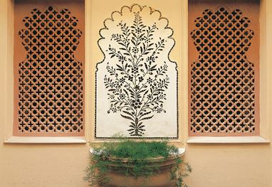 Traditional Thekri mirror art workshop at The Oberoi Udaivilas, Udaipur, showcasing local craftsmanship at a luxury hotel.