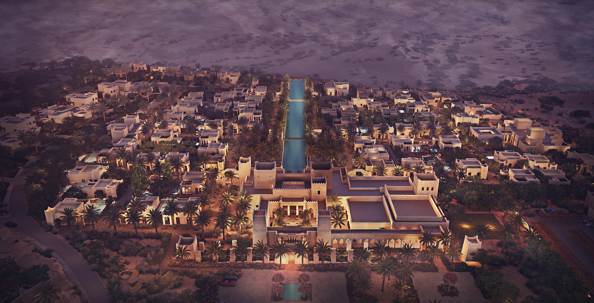 Resort buildings blending with natural Wadi Safar terrain