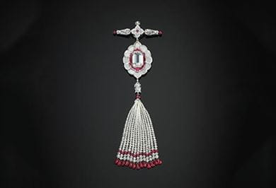 Pendant brooch set with diamonds and rubies. Copyright Servette Overseas Ltd 2014