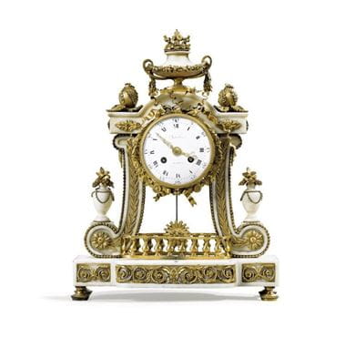 A gilt-bronze white marble mantel clock in Louis XVI style, circa 1880. Courtesy, Sotheby’s