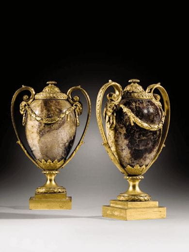 A pair of late 18th century English gilt-bronze and Blue John urns forming candlesticks, attributed to Matthew Boulton. Courtesy, Sotheby’s