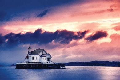 A church perched in a stone in the middle of a fjord in Oslo