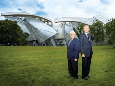 Bernard Arnault, CEO, LVMH and architect Franck Gehry in front of Foundation Louis Vuitton in Paris