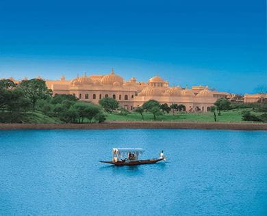 Shikara boat for guest transfers at The Oberoi Udaivilas, Udaipur