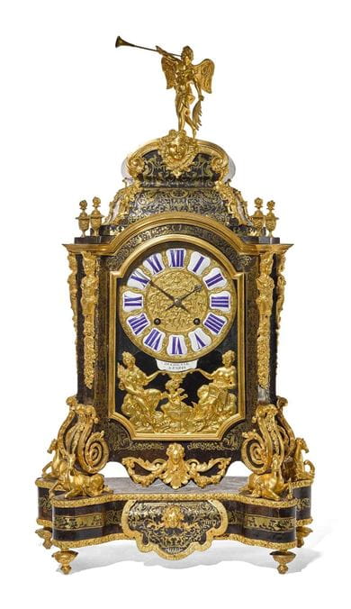 A Louis XIV ormolu mounted tortoiseshell and brass Boulle-inlaid table clock by Pierre Du Chesne, Paris, circa 1705. Courtesy, Sotheby’s