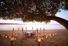 Romantic Sunset Dinner by the Beach at The Oberoi Beach Resort Lombok